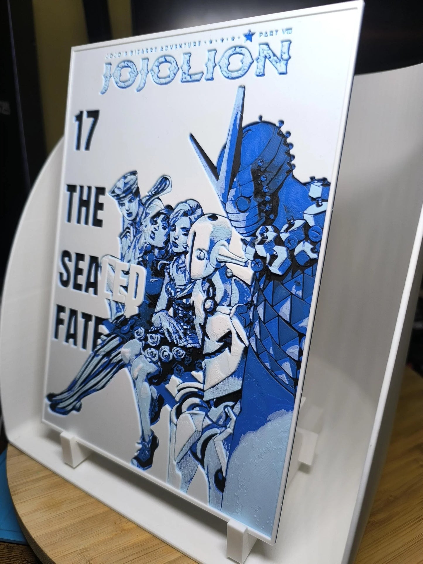 Couverture de manga JoJolion 17 The Sealed Fate avec personnages stylisés en bleu et blanc