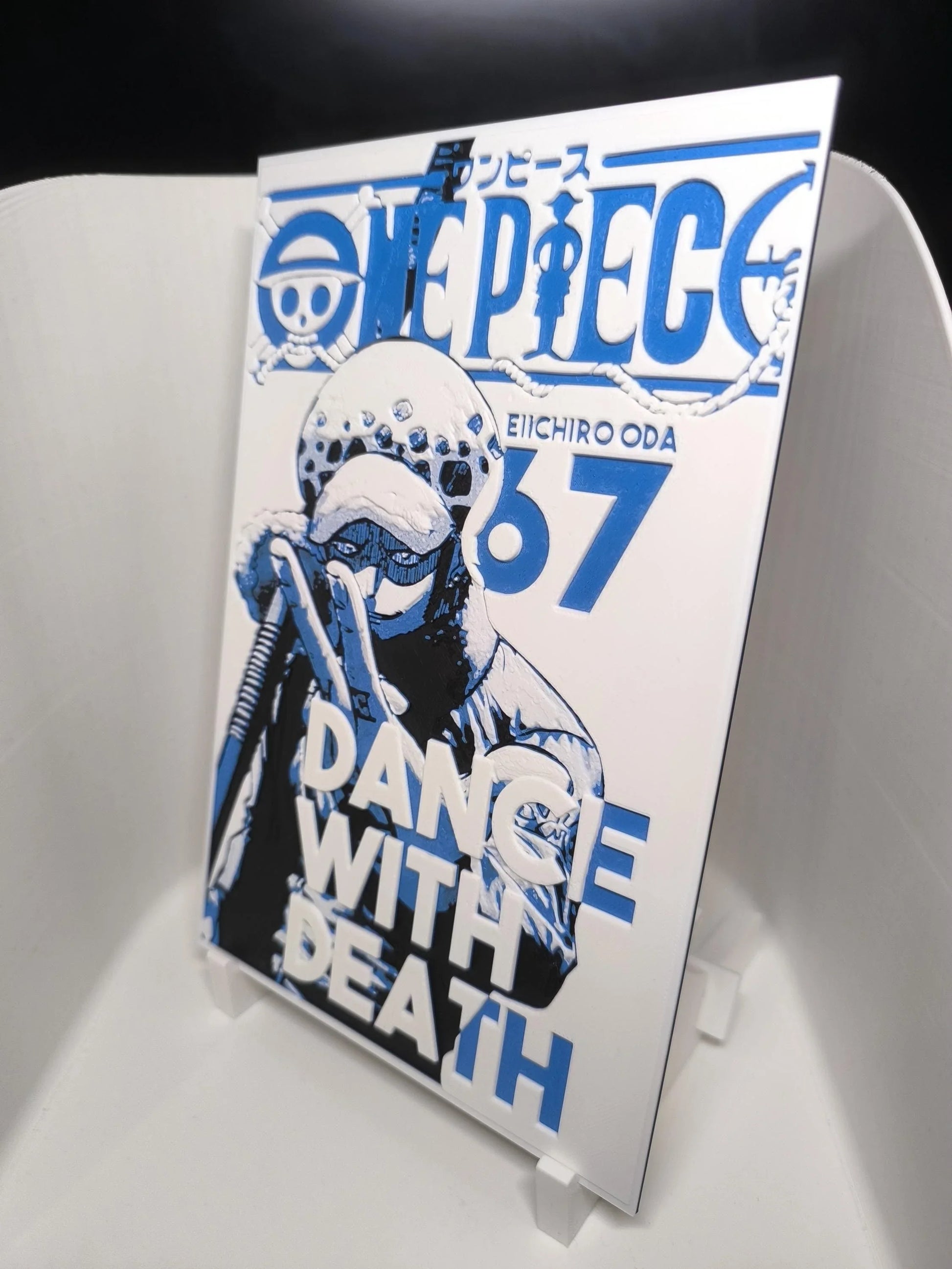 Couverture manga One Piece 67 par Eiichiro Oda avec personnage encapuchonné et texte Dance with Death