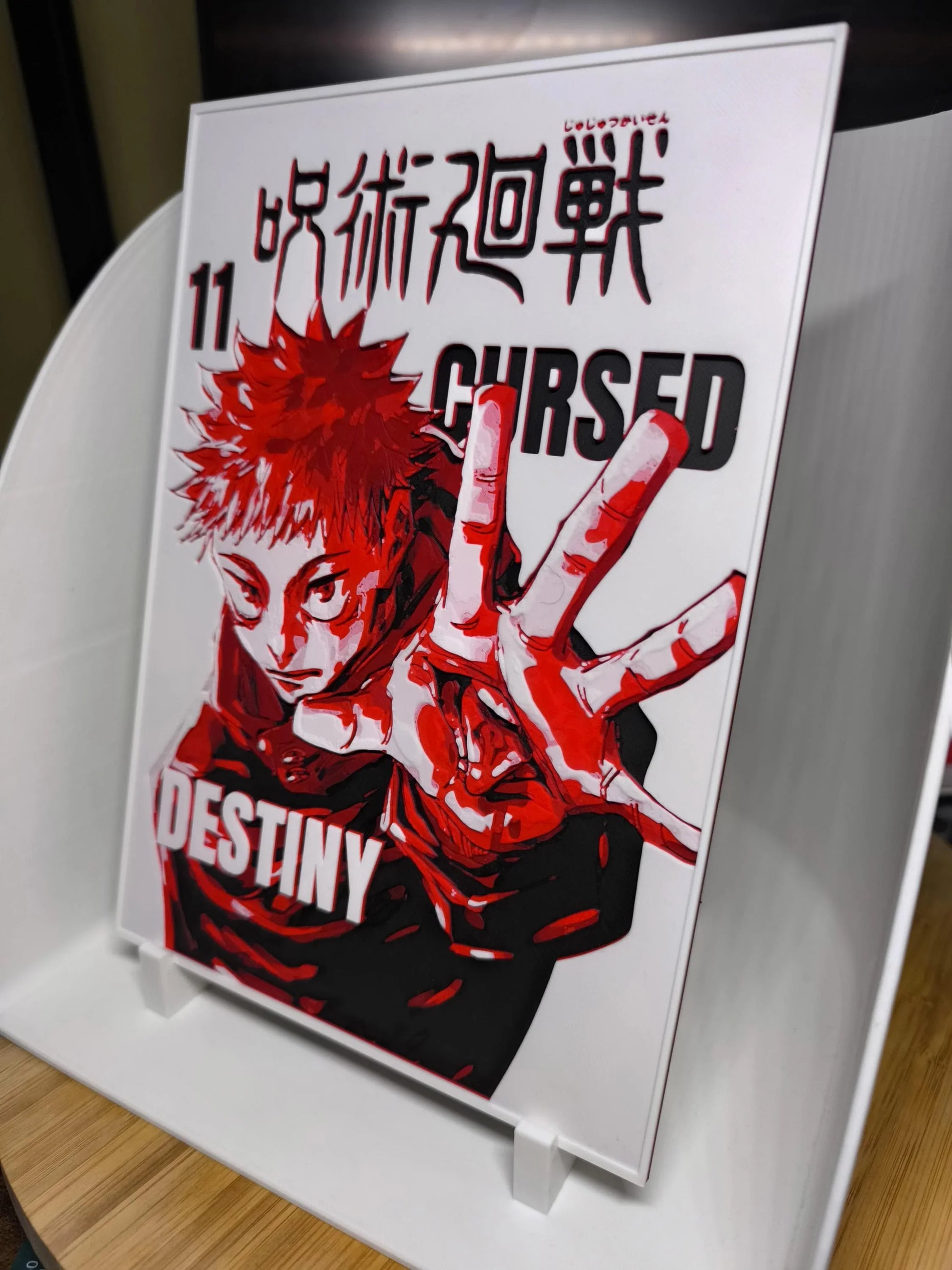 Couverture du manga Jujutsu Kaisen volume 11 avec personnage en rouge et noir, mains tendues, mots 'CURSED' et 'DESTINY'
