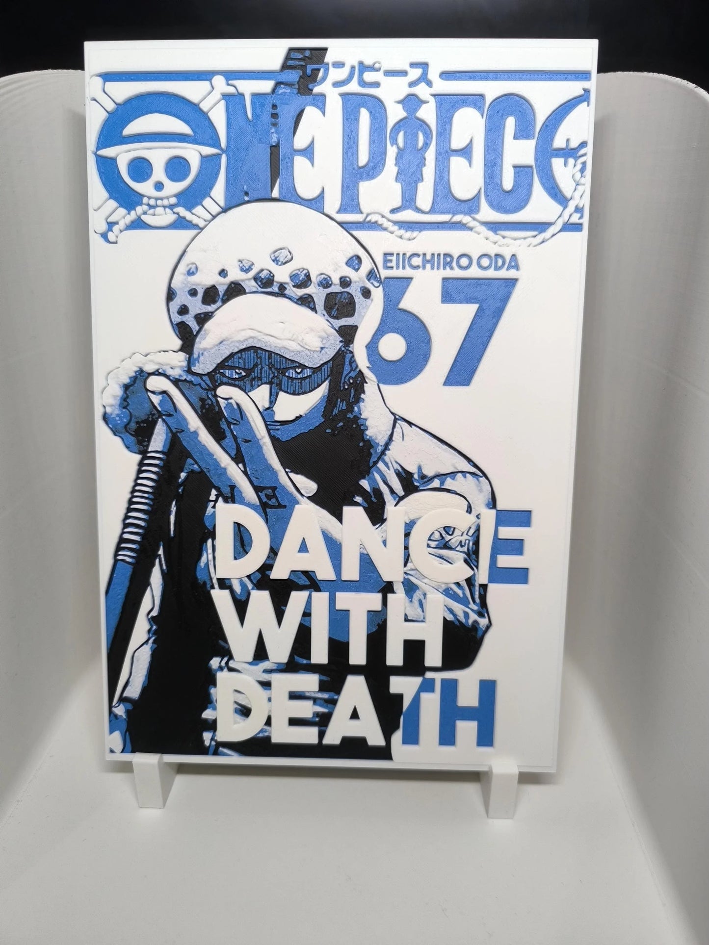 Couverture de manga One Piece tome 67 avec illustration de Trafalgar Law et texte Dance with Death