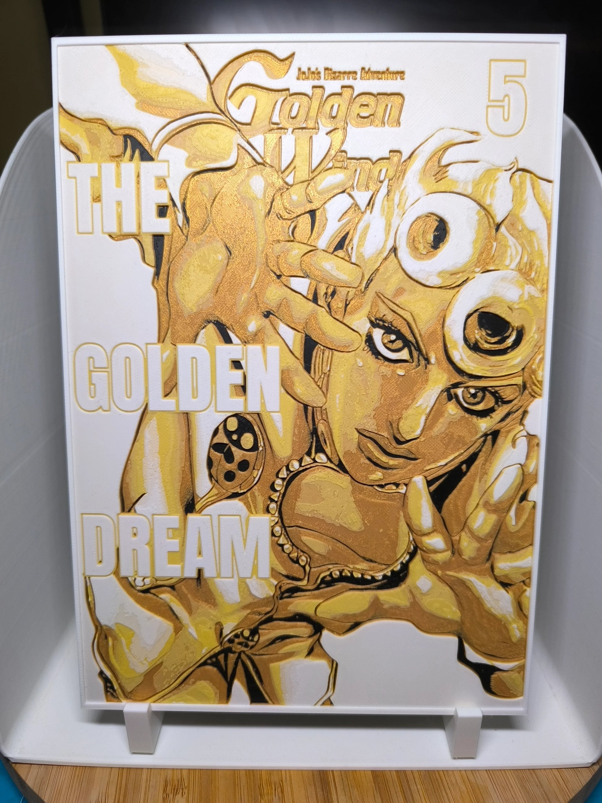 Illustration dorée du personnage Golden Wind de JoJo's Bizarre Adventure avec le texte The Golden Dream