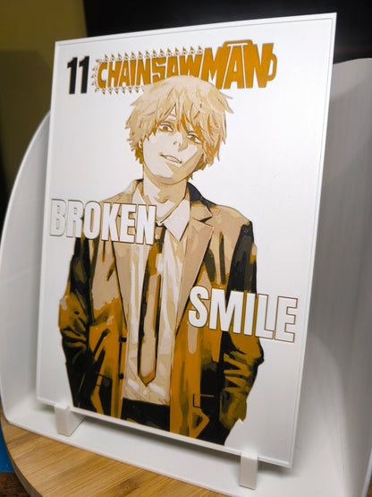 Couverture manga Chainsaw Man tome 11 avec personnage en costume et texte Broken Smile