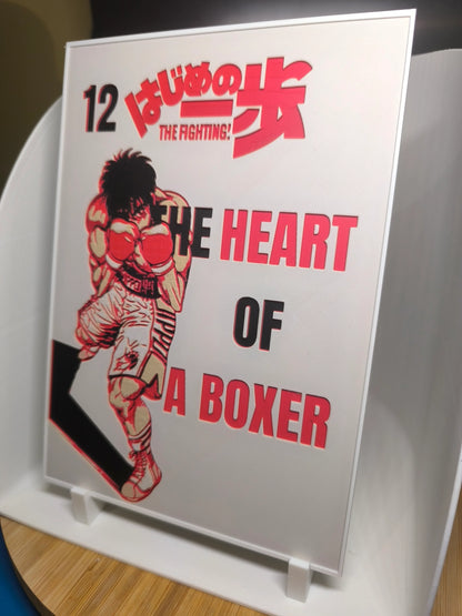 Couverture manga Hajime no Ippo volume 12 avec boxeur en position de combat et texte The Heart of a Boxer