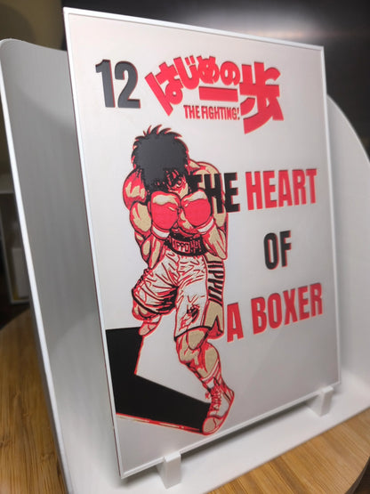 Couverture manga The Fighting! tome 12 avec un boxeur en position de combat, couleurs rouges et blanches