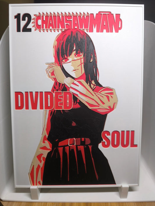 Couverture manga Chainsaw Man volume 12 avec personnage féminin et texte Divided Soul