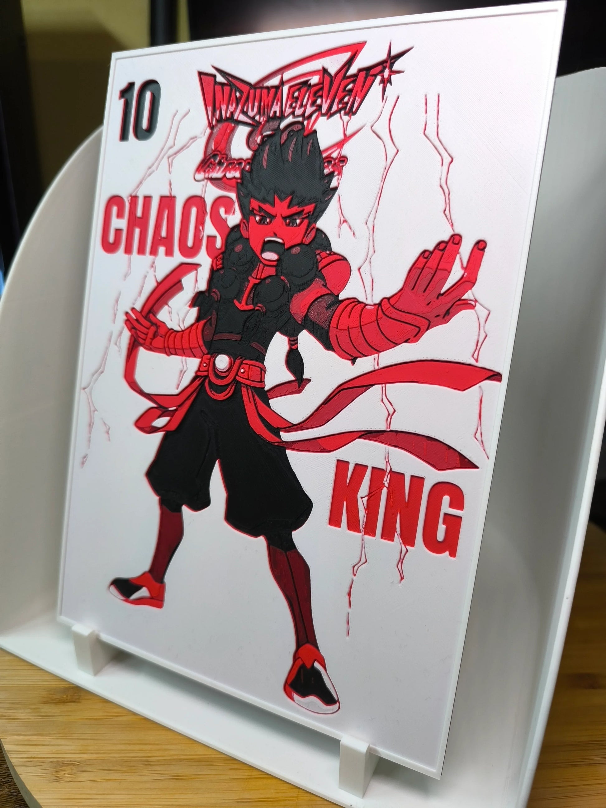 Illustration rouge et noir d'un personnage animé en posture de combat avec texte Chaos King et chiffre 10