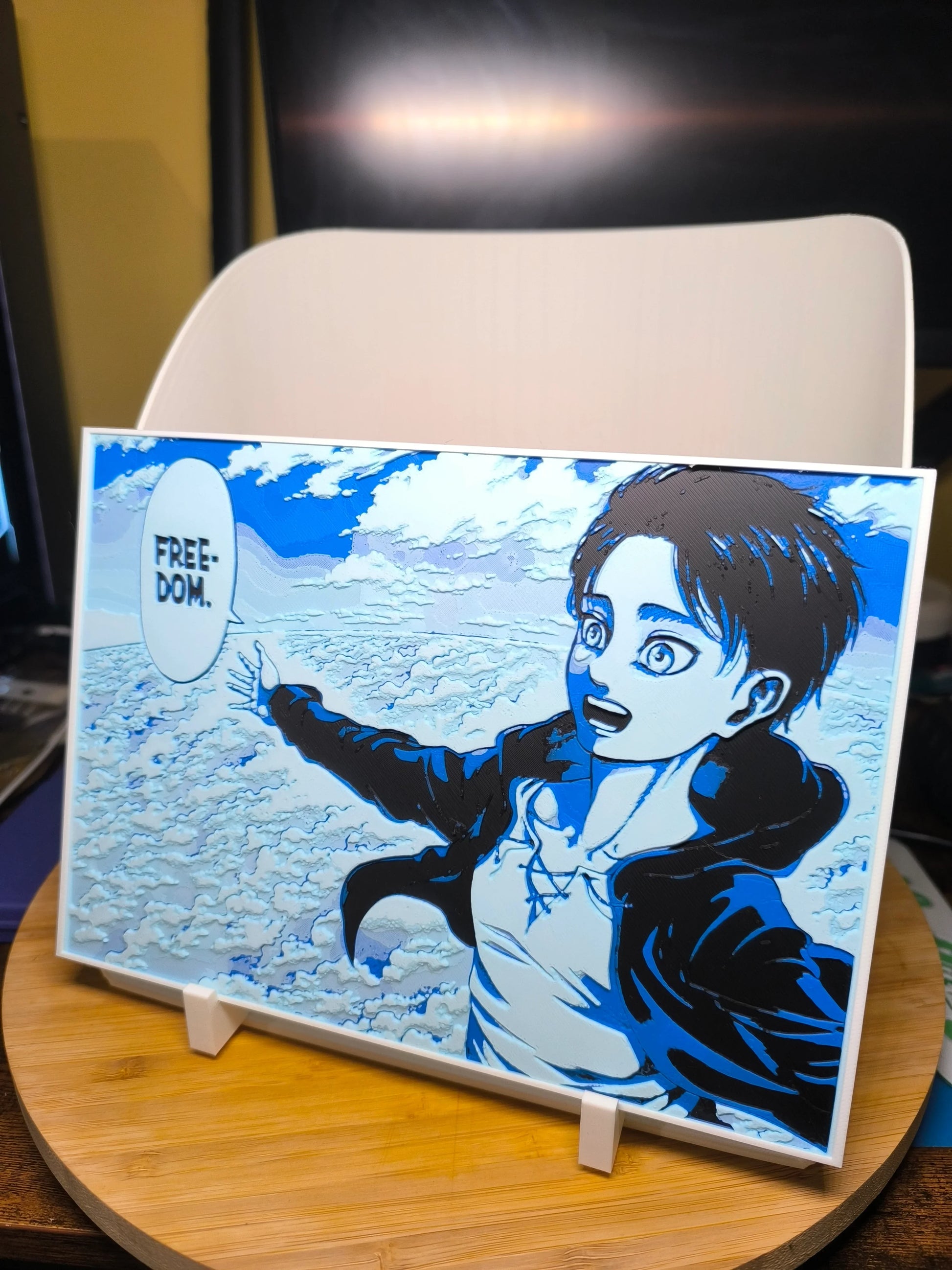 Tableau manga avec personnage s'étendant vers ciel nuageux et texte "FREEDOM" sur support blanc