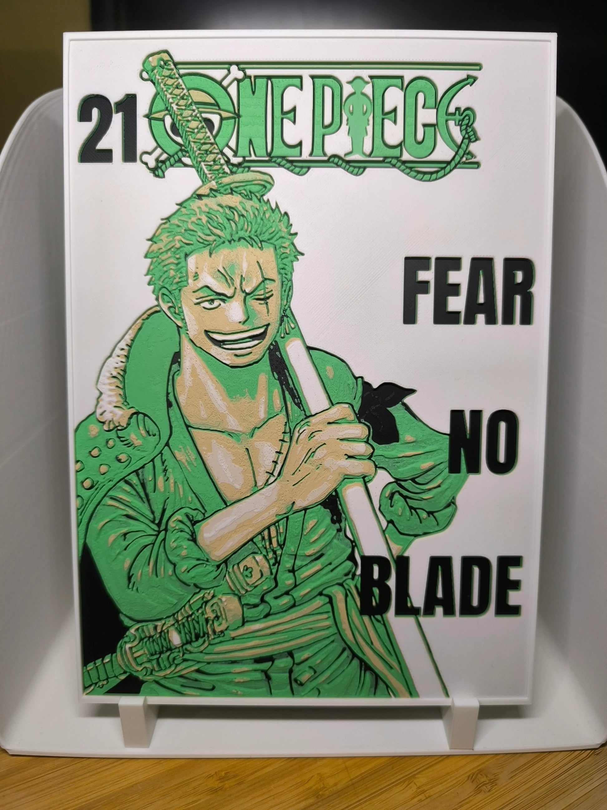 Illustration de Roronoa Zoro de One Piece avec épée, texte 'Fear No Blade', édition numéro 21