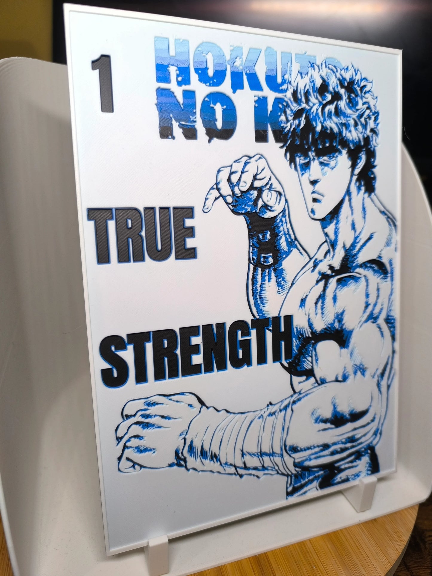 Illustration musclée de personnage avec bandages, texte HOKUTO NO KEN, TRUE STRENGTH